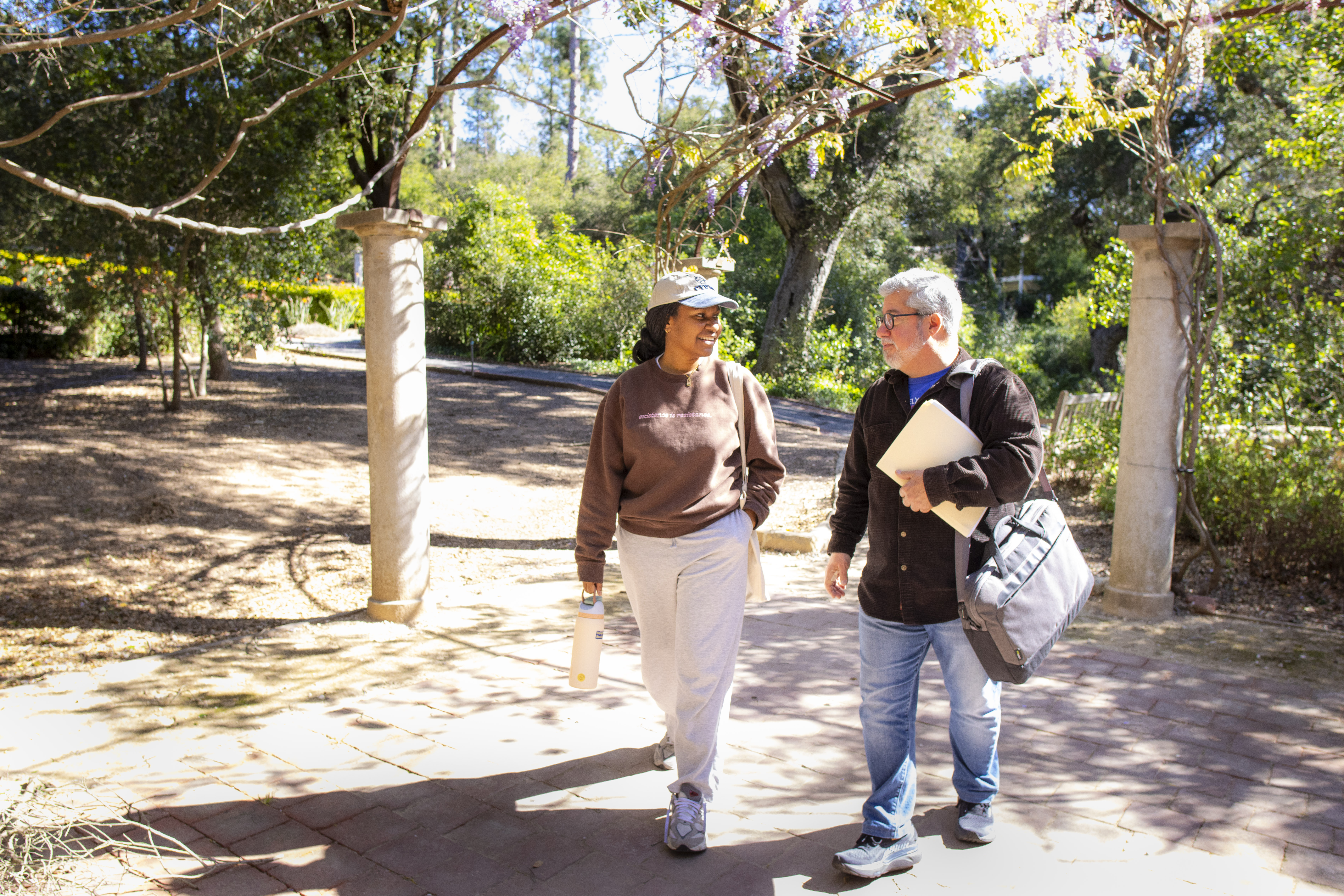 westmont student and professor walking on campus