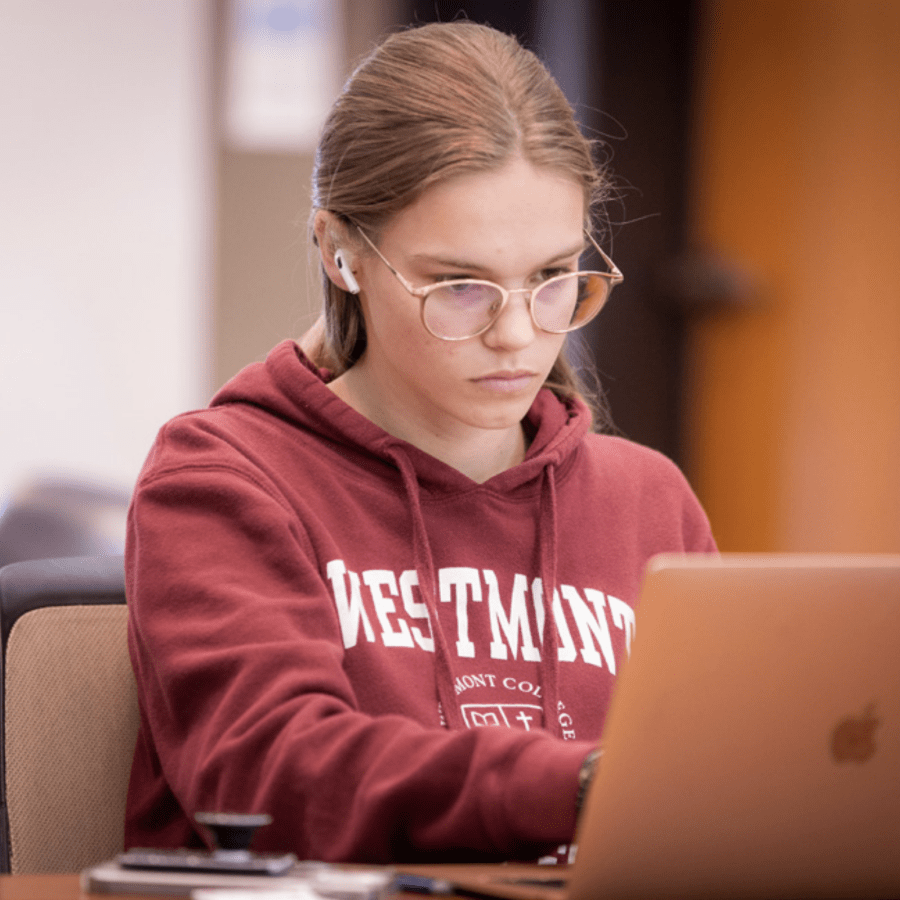 westmont female student studying on computer