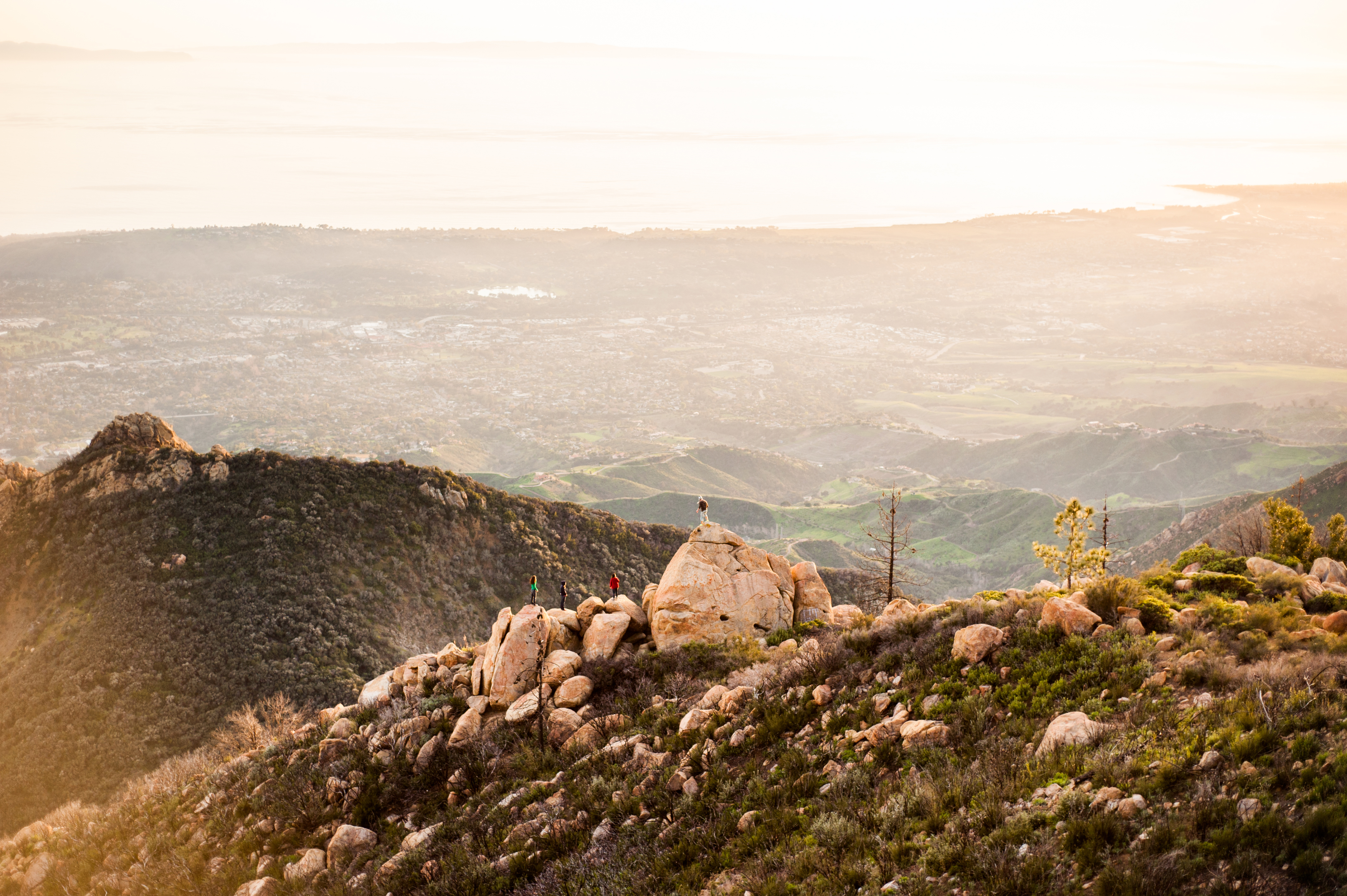 Students hiking on top of rocks in Santa Barbara mountains