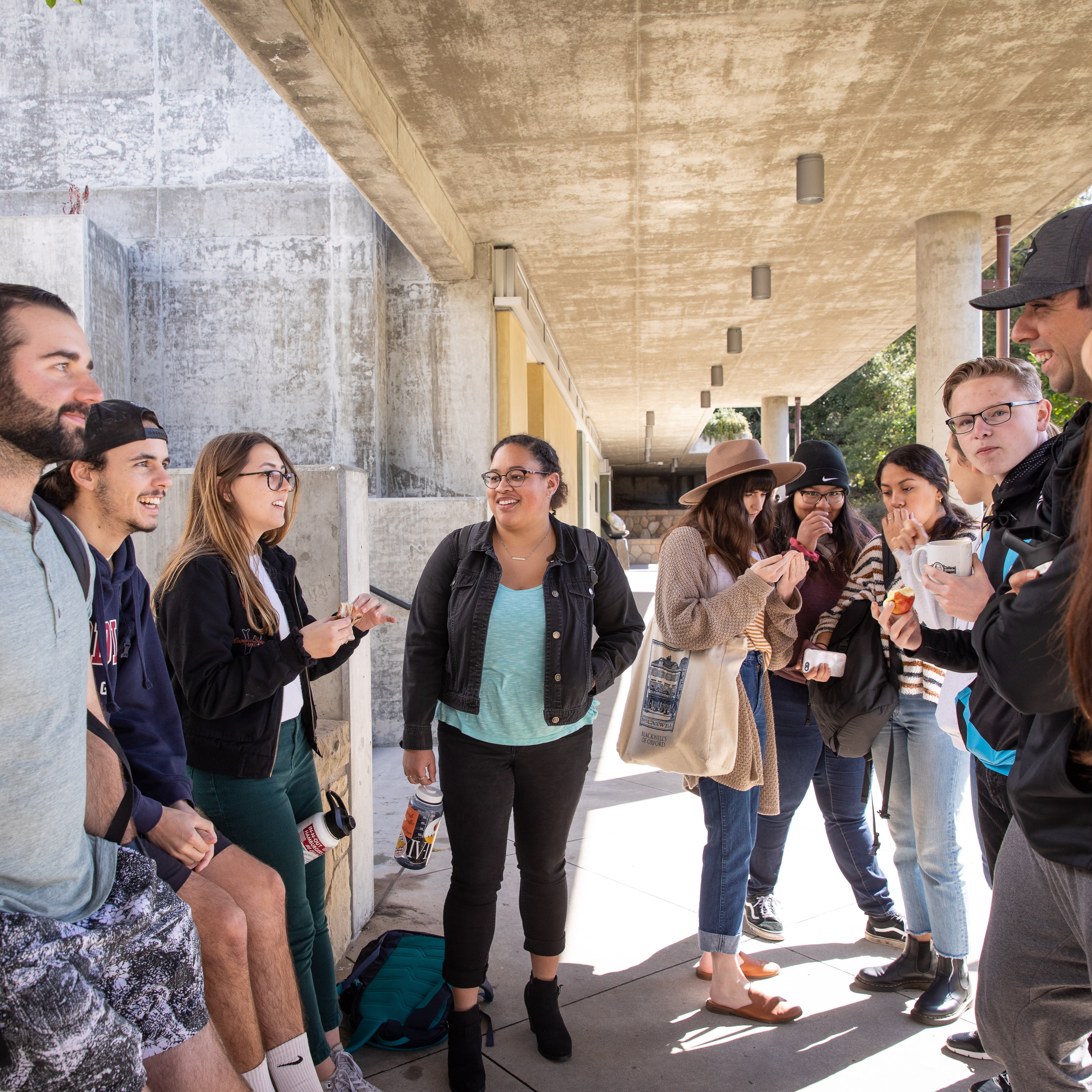 group of westmont students conversing on campus