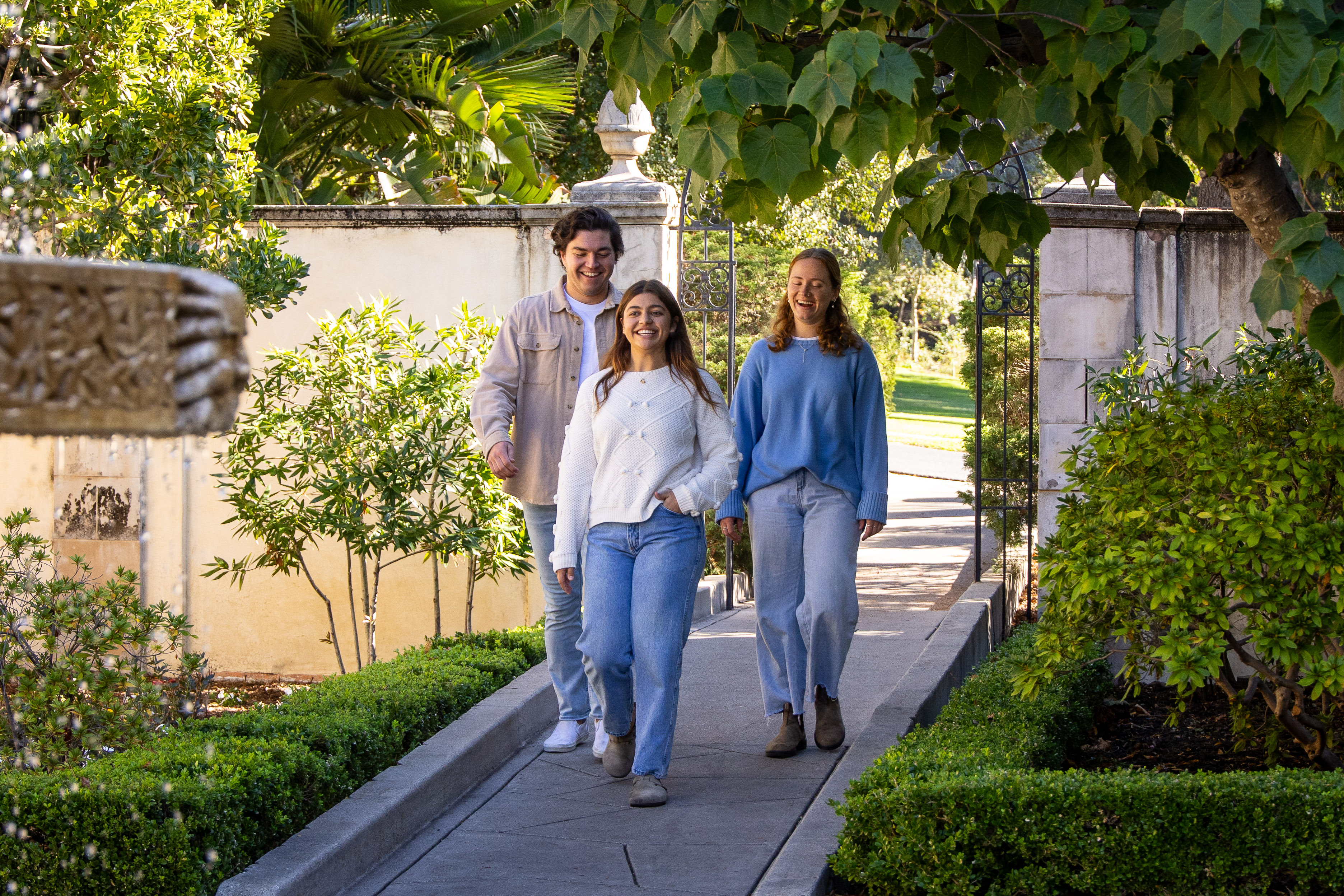 students walking together near westmont fountain