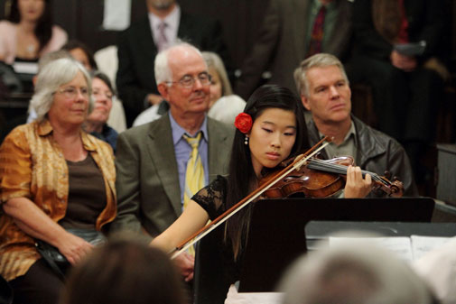 Catherine Lee performs in front of master violin maker James Wimmer at the Nov. 20, 2009, unveiling of the Schwyzer Quartet