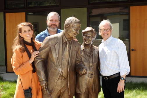 Sculptors T.J. Dixon and James Nelson pose with the statue of the Winters and Trustee Walter Hansen (right)