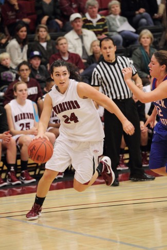 Tugce Canitez drives to the hoop.