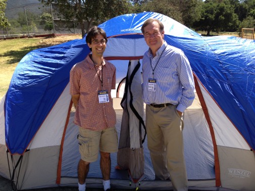 Neil Di Maggio, director of research,  and Provost Mark Sargent proudly display their tent