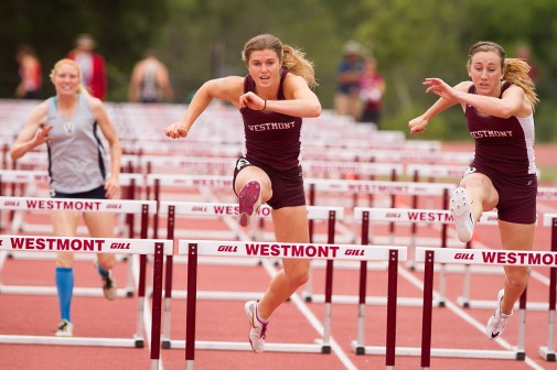 Collier competes in the 100-meter hurdles