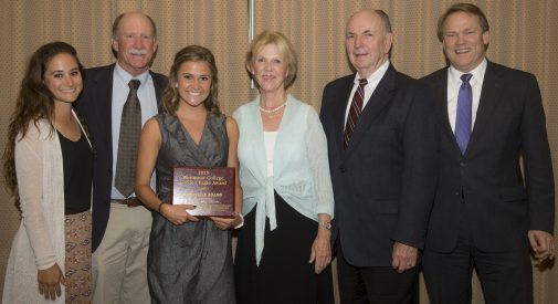 Christine Adams with coaches  Chantel Cappuccilli and Dan Ribbens, the Jordano's and President Beebe