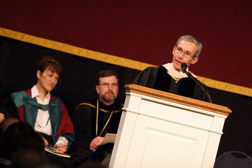 Michael Shasberger speaks at his installation flanked by former provost Shirley Mullen and former president Stan Gaede in January 2006.