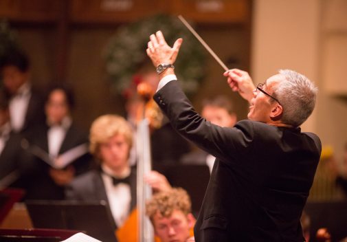 Dr. Michael Shasberger conducts the orchestra and choir