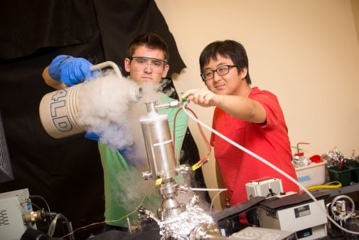 Students Christopher Riba and Han Chung conduct chemistry research under the supervision of Dr. Allan Nishimura
