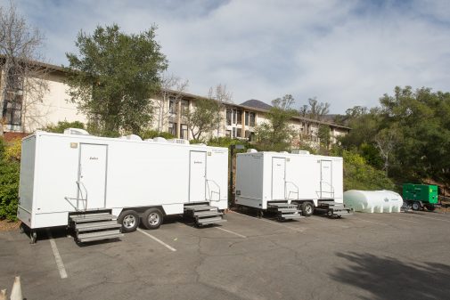 Portable showers and restrooms have been brought onto campus due to lack of drinkable water