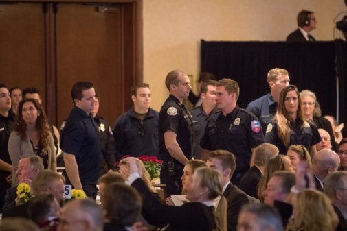 First responders stood before receiving a standing ovation