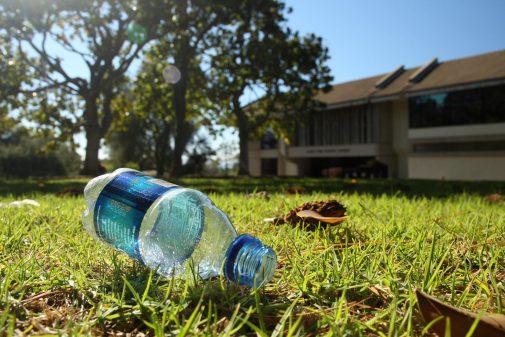 a used plastic water bottle sits on Magnolia Lawn at Westmont, environmental studies