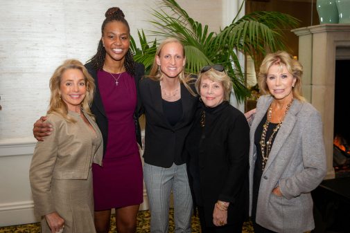 Andria Kahmann, Penny Jenkins and Anna Grotenhuis, the Women’s Leadership Council co-chairs, pose with Tamika Catchings and director Kirsten Moore.