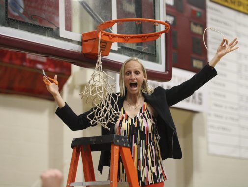 Head Coach Kirsten Moore celebrates