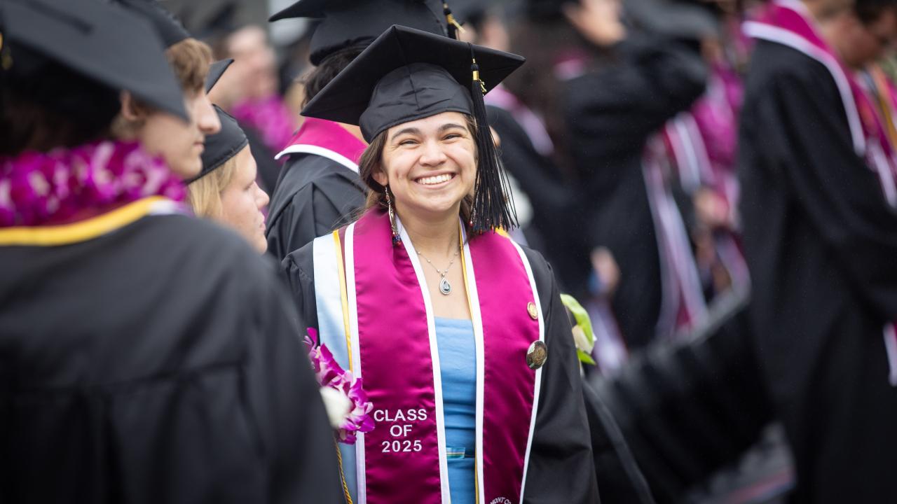 westmont Commencement 2025 graduate smiling at camera
