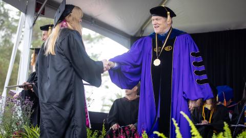 westmont Commencement 2025 graduate receiving diploma