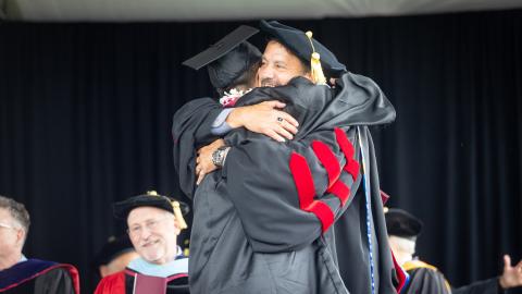 westmont Commencement 2025 student hugging professor