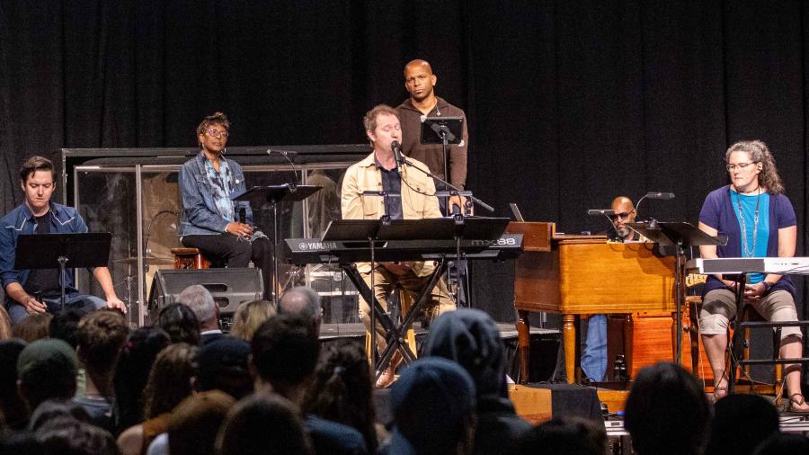 Dave LeMieux performs at the table with Dr. King