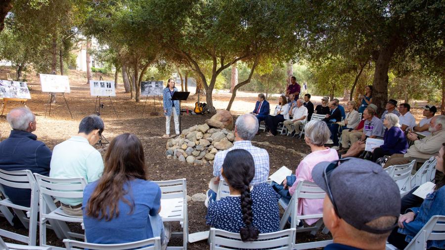 Megan Harter Adams speaks at the Potter's Clay memorial