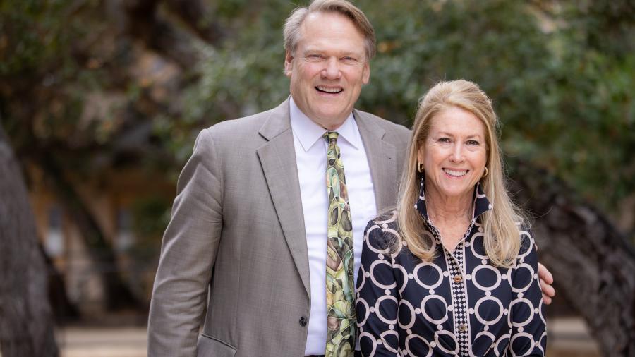 Westmont president Gayle Beebe and awardee Chris Emmons at luncheon.