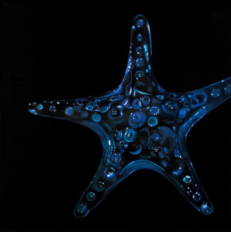 black background with blue sea star painting