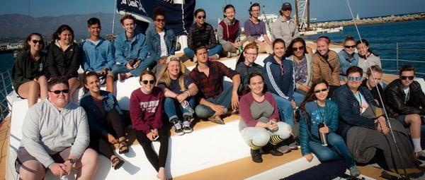 Boat, students, trailhead