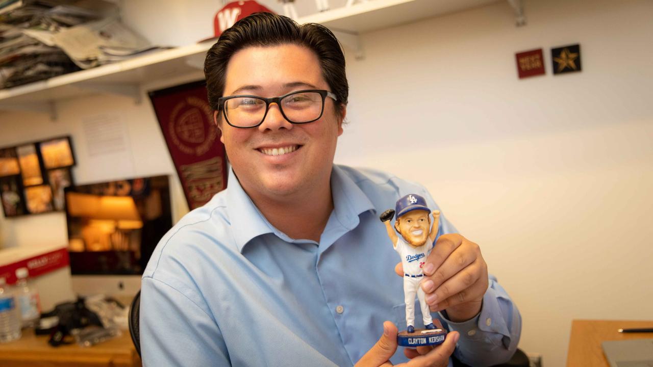 Jacob Norling with Clayton Kershaw bobblehead