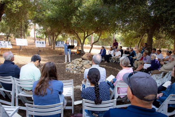 Megan Harter Adams speaks at the Potter's Clay memorial