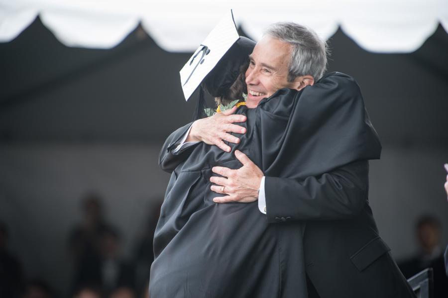 Michael Shasberger hugs his daughter, Rebecca '15, at Commencement 