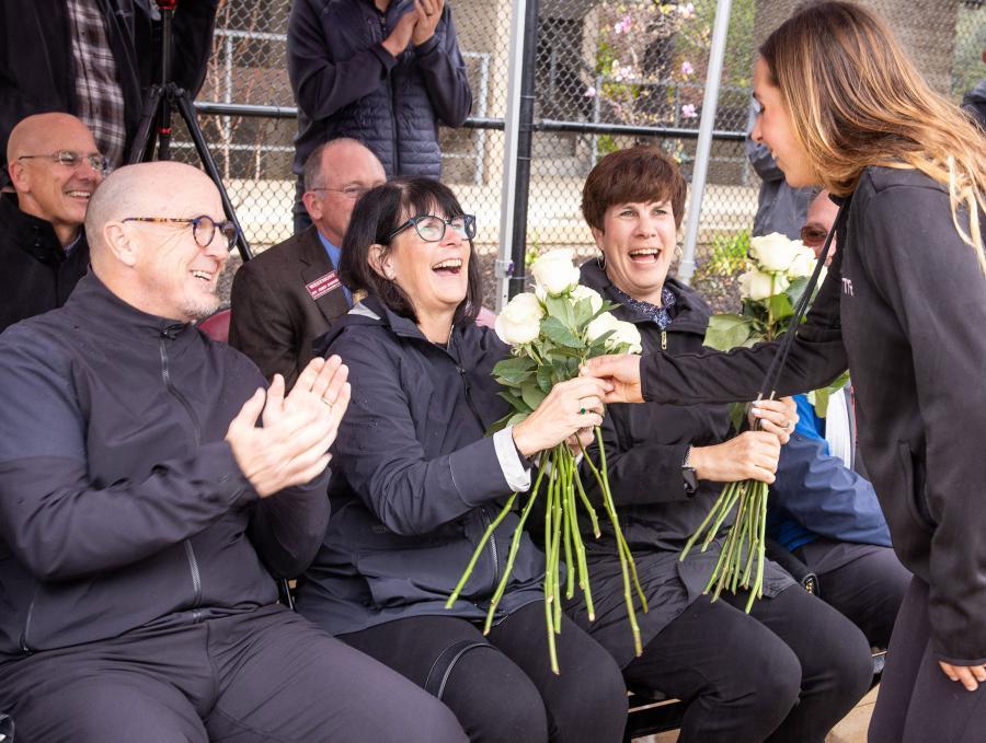 The Names sisters receive flowers from the Westmont women's swimming team