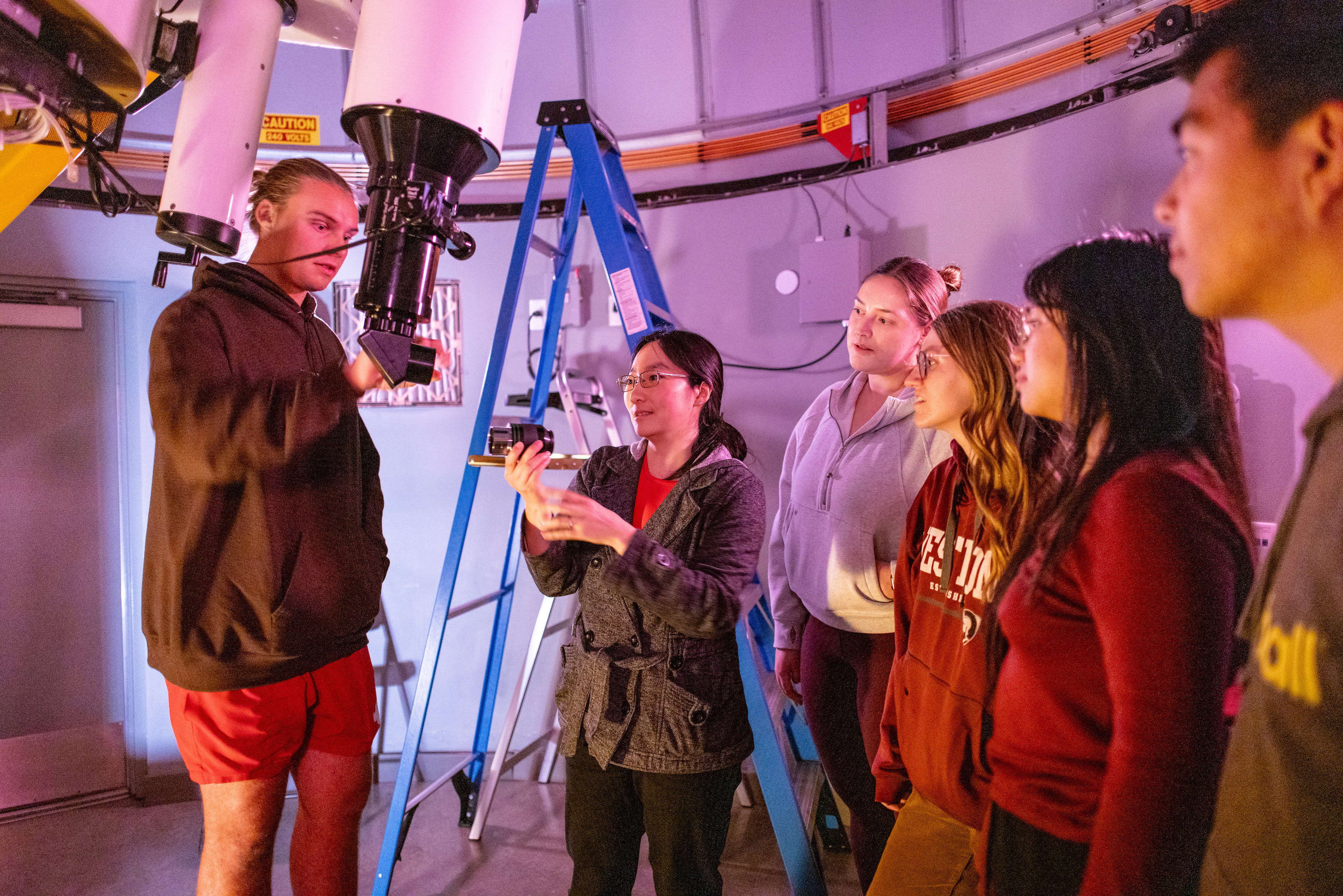 Westmont students use the Keck telescope on campus during the observational astronomy course taught by Dr. Ito.